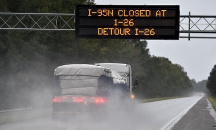 An alert board announces the closing of Interstate 95 due to the flash floods at the crossing with Interstate 26 in South Carolina on Monday.