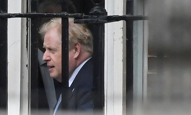 Boris Johnson leaves from the back entrance of Downing Street.