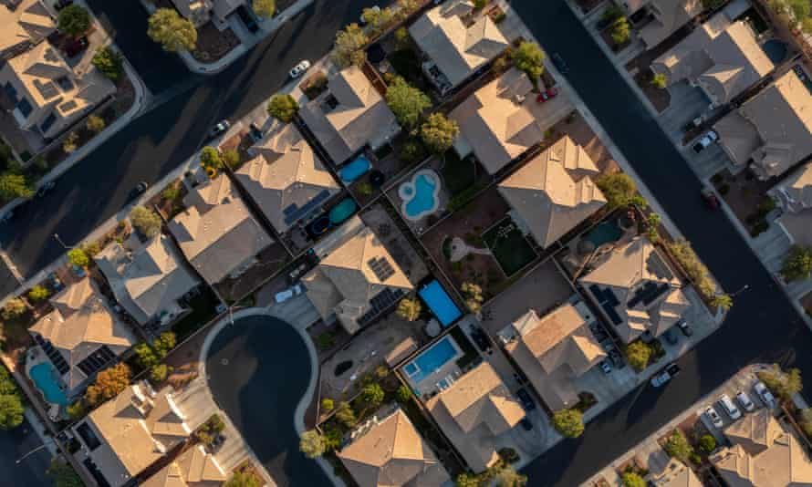 Houses, trees and pools spring from the desert in Henderson, Nevada.