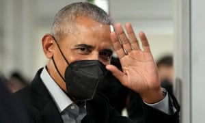 Barack Obama waves to the crowds
