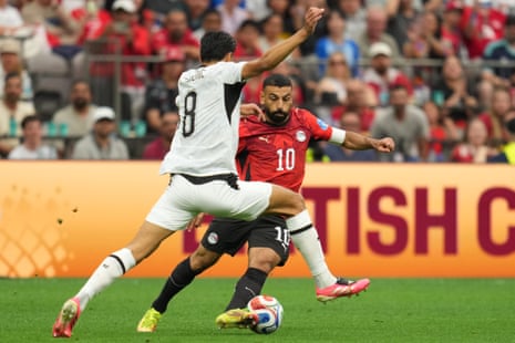 Mo Salah takes on New Zealand's Marko Stamenic