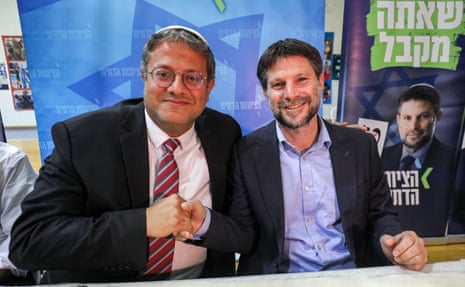 Itamar Ben-Gvir (L) and Bezalel Smotrich (R) attend a rally with supporters in the southern Israeli city of Sderot on 26 October 2022.
