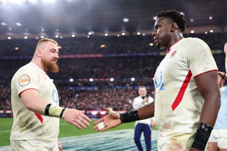 Maro Itoje of England shakes hands with Joe Heyes after the match