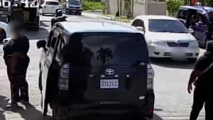 CCTV shows moment police allegedly shoots woman in Jamaica – video