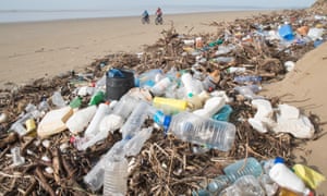 Plastic litter washed up on Pembrey beach, Carmarthenshire, Wales, UK.