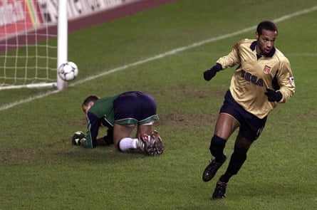 Thierry Henry cooly slots home the opening goal from the spot