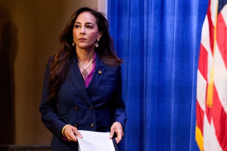 a women with a piece of paper in hand