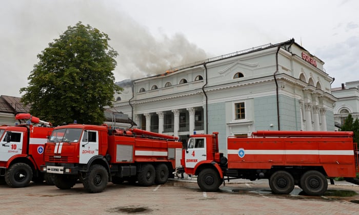 Firefighters extinguish a fire on the roof of a railway station in DonetskFirefighters extinguish a fire on the roof of a railway station following recent shelling during Ukraine-Russia conflict in Donetsk, Ukraine August 5, 2022. REUTERS/Alexander Ermochenko