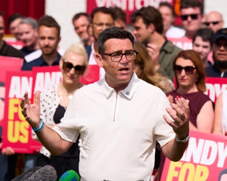 Andy Burnham and supporters celebrating at Ashton Town FC the morning after winning the Makerfield byelection.