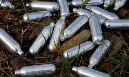 Discarded nitrous oxide gas canisters