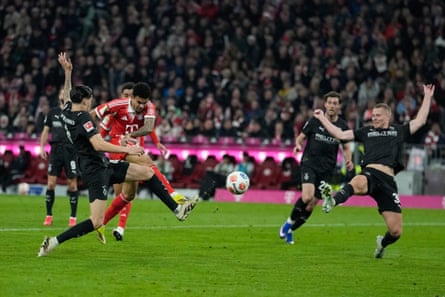 Luis Díaz leathers the ball toward the goal