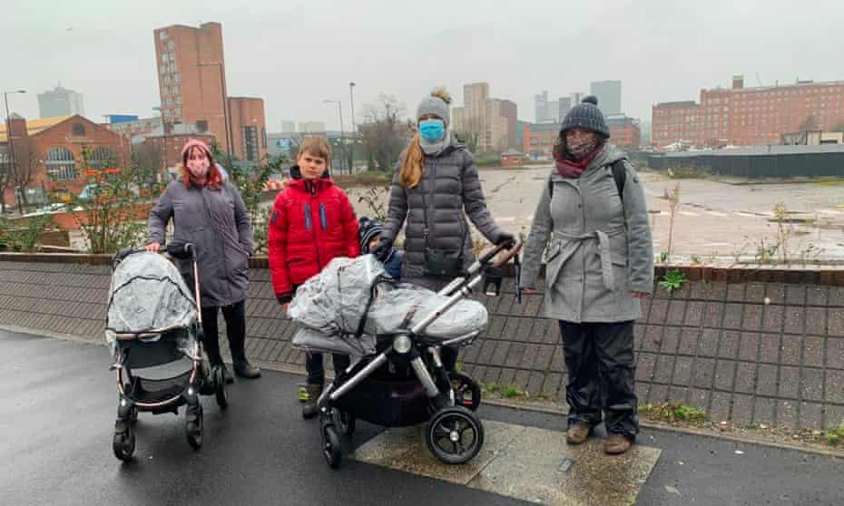 Campaigners Gemma Cameron, Julia Kovaliova and Claire McDonald with their children at the former retail park in Ancoats.