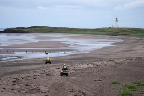 Police officers guarding the beach near the Trump Turnberry golf course this morning where President Donald Trump is staying.