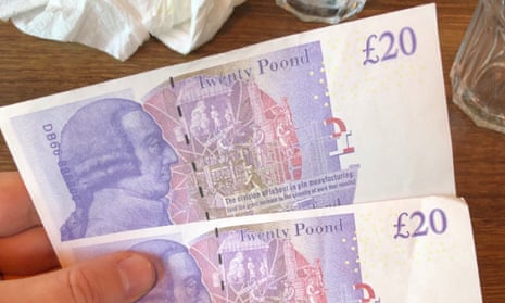 Two fake £20 notes with the words Twenty Poonds in big letters