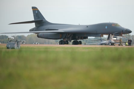 US air force personnel work on a B1 bomber at RAF Fairford on Monday.