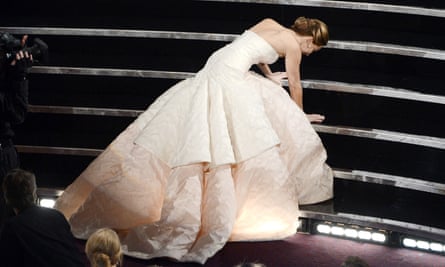 Jennifer Lawrence stumbling on her way to the Oscar stage in 2013