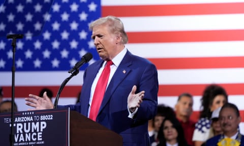 Donald Trump on stage at political rally