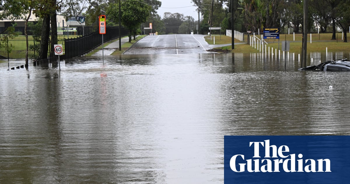 Man found dead in Queensland floodwaters as state hit by days-long deluge