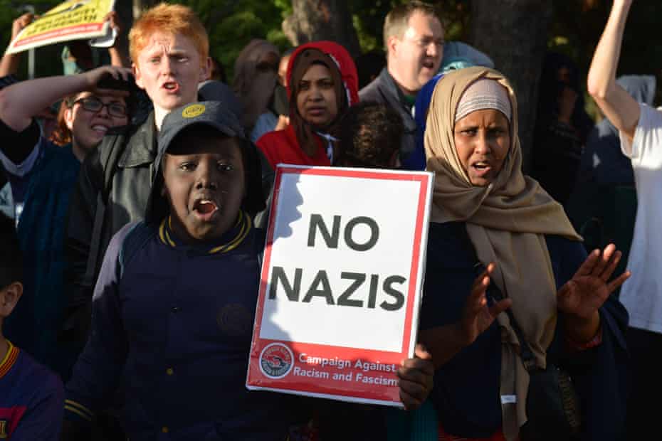 Protesters holding a "No Nazis" sign in Melbourne.