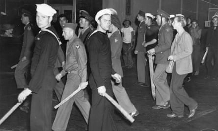 US armed forces personnel with wooden clubs during the ‘zoot suit’ riots in 1943.