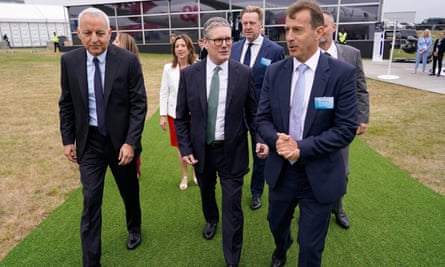 Keir Starmer with Rolls-Royce chief executive Tufan Erginbilgiç (left) and Airbus chief executive Guillaume Faury (right) at the Farnborough airshow.