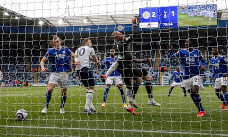 Kasper Schmeichel (centre) fumbles a cross into his own net to gift Tottenham an equaliser. 