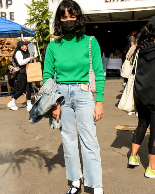 Joellen Lu wearing an Entireworld sweater at Fahm Market, Los Angeles.