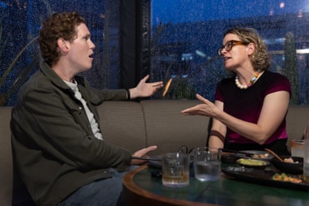 Patrick and Molly chatting at a restaurant table