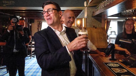 Andy Burnham with a pint