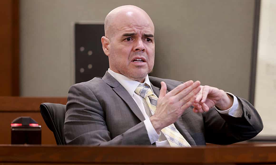 Robert Telles sits in the witness stand.
