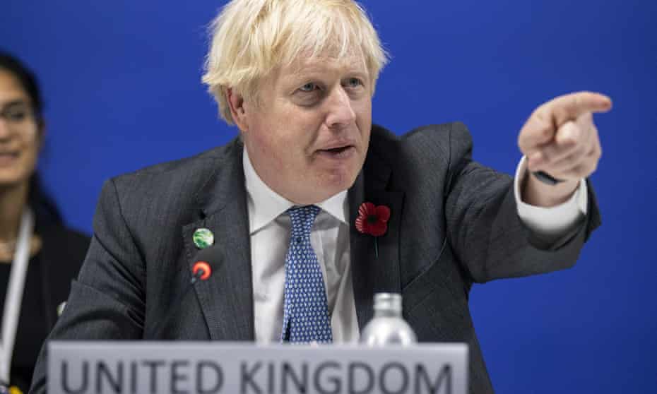 Boris Johnson gestures during a speech.