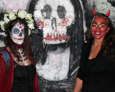 Tomb ravers … partygoers at last year’s Kataloween, with a macabre mockup of the Mona Lisa.