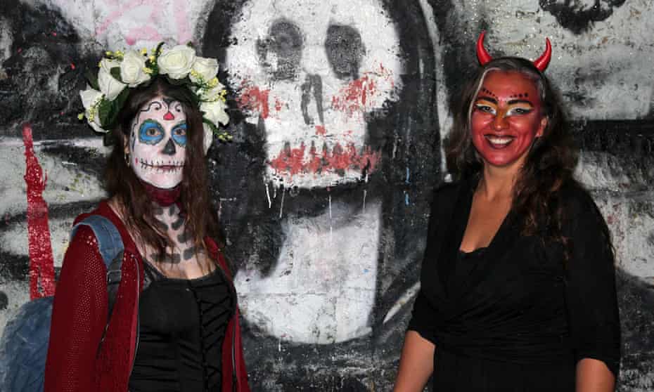 Tomb ravers … partygoers at last year’s Kataloween, with a macabre mockup of the Mona Lisa.
