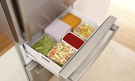 open full fridge drawer with frozen food