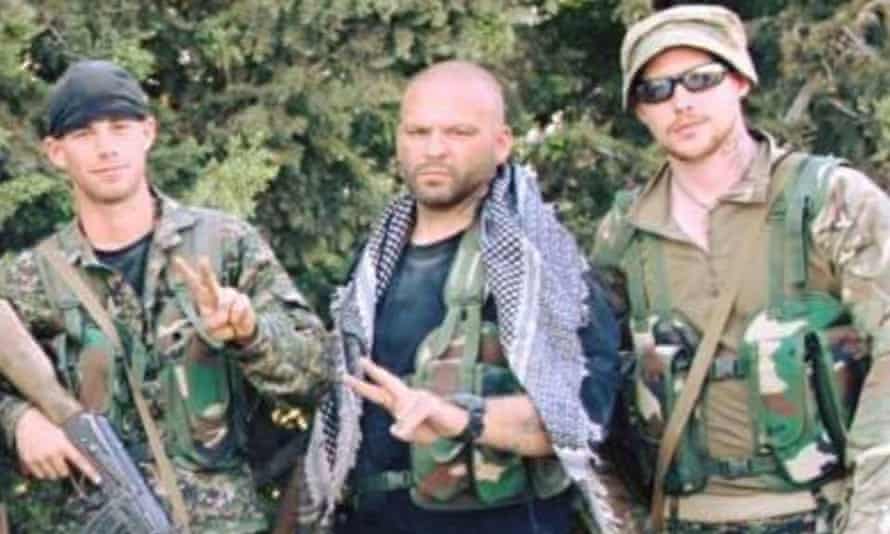 Joe Robinson (right) with other foreign fighters in Tal Abyad, Syria.