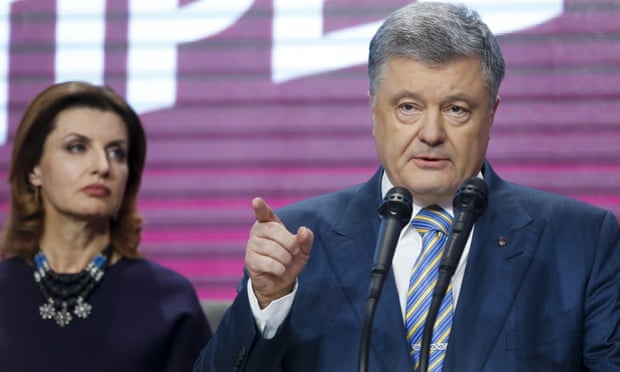 Petro Poroshenko concedes defeat in Ukraine’s presidential election as his wife, Maryna, looks on