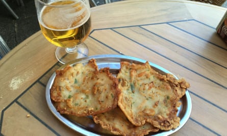 tortillas de camarones with beer on table