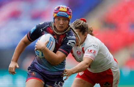 Wigan Warriors’ EIsabel Rowe surges forward to score a try at Wembley.