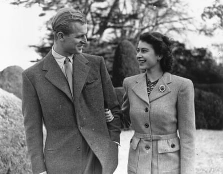 Princess Elizabeth and Prince Philip enjoy a walk during their honeymoon at Broadlands, Hampshire.