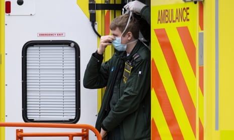An NHS worker wearing a face mask.