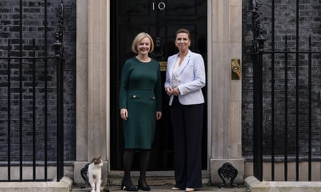 Liz Truss (left) greets Danish Prime Minister Mette outside 10 Downing Street in London. (AP Photo/Alberto Pezzari)
