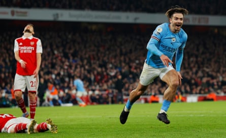 Jack Grealish celebrates after scoring to put Manchester City 2-1 ahead during the F.A. Premier League match between Arsenal and Manchester City at the Emirates Stadium in February 2023.