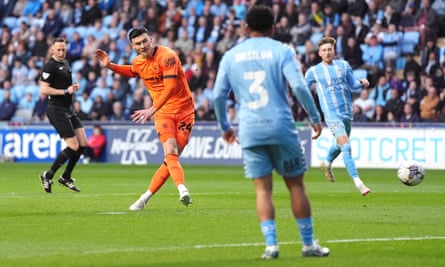 Ipswich’s Kieffer Moore scores his team’s first goal against Coventry.