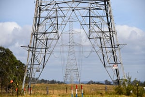 An electricity tower going through a rural property