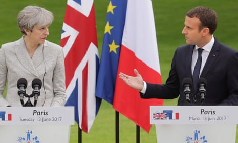 Theresa May and Emmanuel Macron in Paris on 13 June.