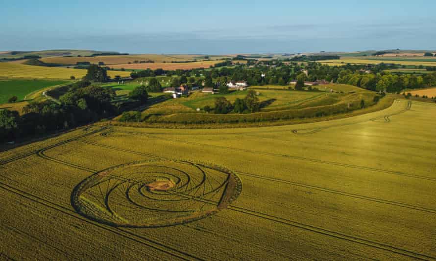 ‘Stunning distractions designed to raise questions rather than offer answers’ … a crop circle near the Avebury stones in Wiltshire.