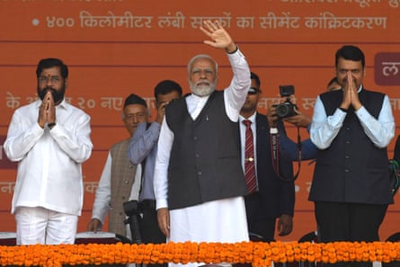 Modi waves among different officials.