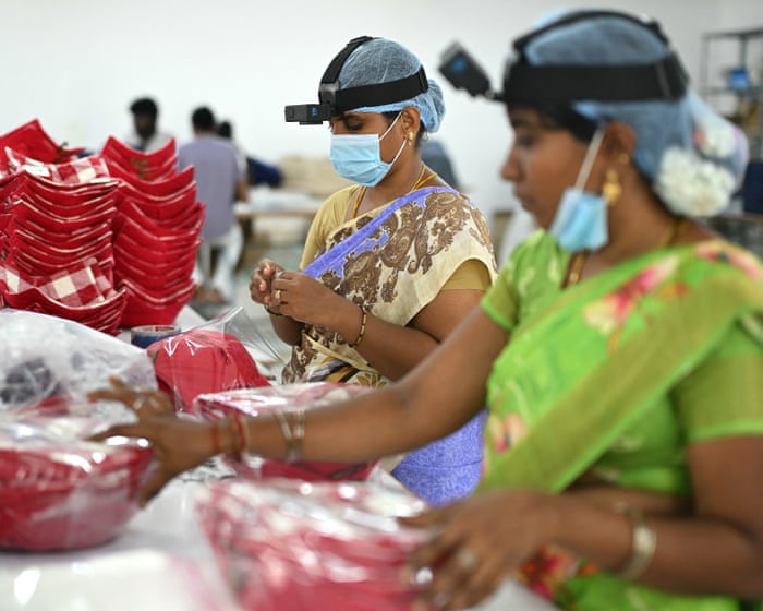 ‘Who is going to pay us when we’re replaced by robots?’ The Indian factory workers told to film themselves for AI