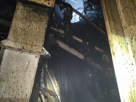 A picture of daylight seen through tangled metal