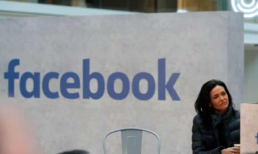 Sheryl Sandberg listens to speeches during a visit in Paris on January 2017.